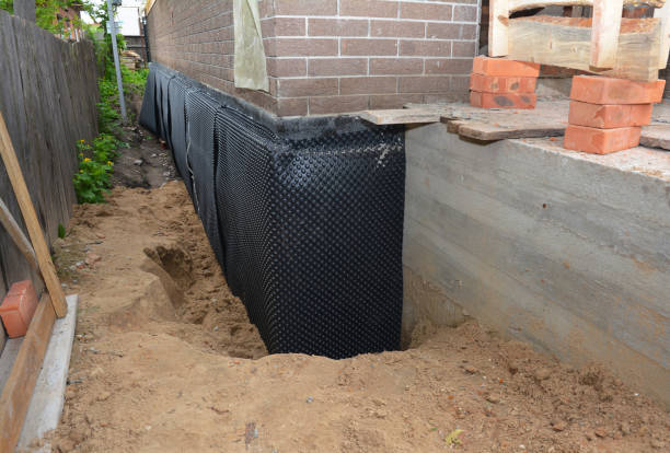 SJ Waterproofing Pros technician performing targeted Exterior Waterproofing assessment in Cloverdale, OH